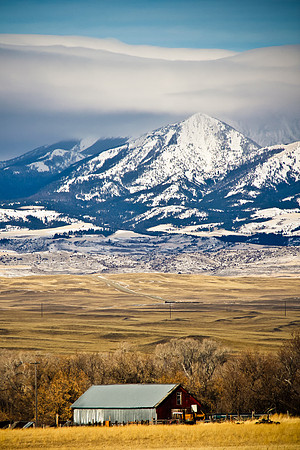 Barn tucked against the Crazy Mountains